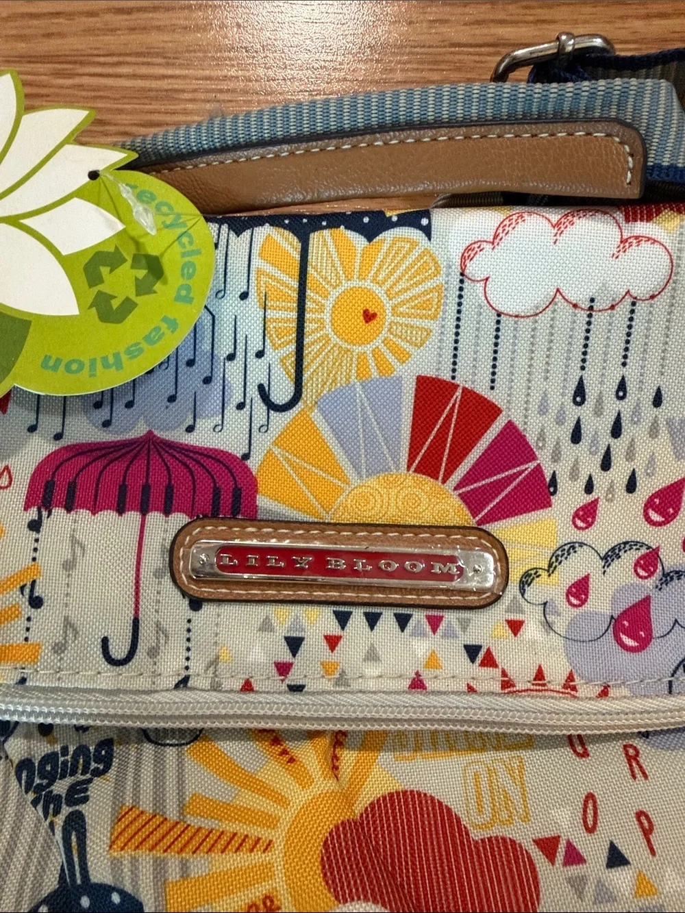 NWT!!!! Lily Bloom eco friendly Cream Multi-Color Rain & Sun Print Backpack